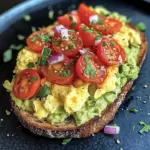 Avocado Toast with Scrambled Eggs and Tomato